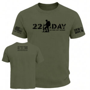 A green Zero Hour "22 A Day" t-shirt featuring a kneeling soldier silhouette and "No One Left Behind" text. The sleeves display a tactical American flag with "I Got Your Six" and the Zero Hour logo. The back shows the mission statement: "The Battle Within, 22-0-365.